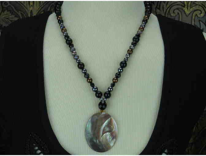 Timeless Necklace features Paua Shell Profile Pendant, Pearls, Onyx, and Hematite!