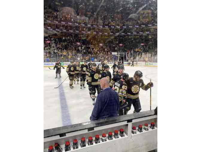 Boston Bruins - 2 tickets right behind the Bruins Bench!!