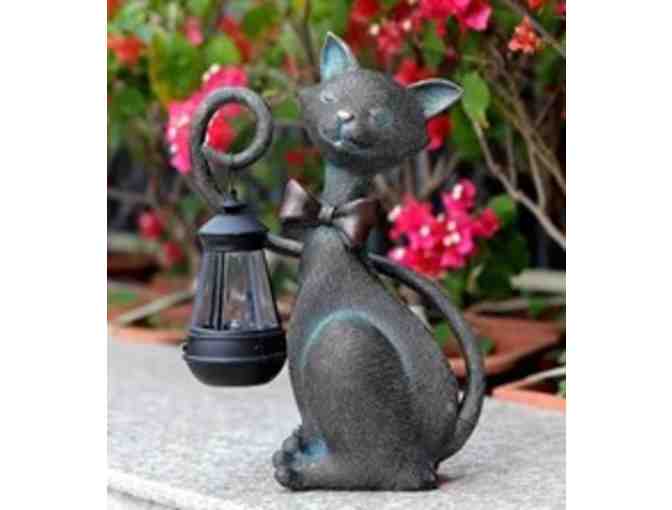 A Pair of Solar Cat Statues