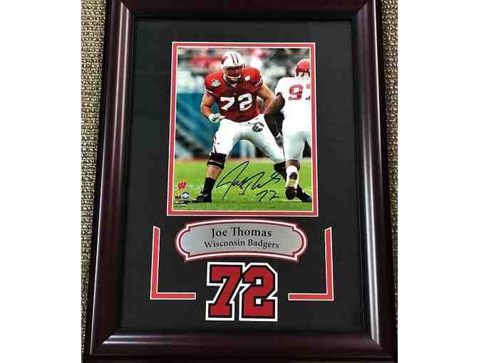 Joe Thomas, 8X10 Wisconsin Badger photo autographed, framed with laser cut double matted
