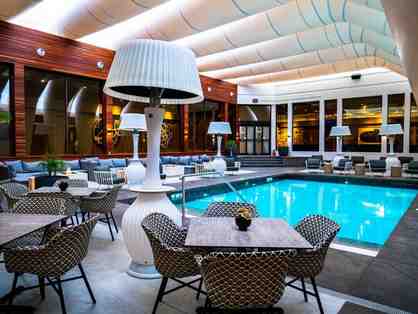 1 night stay at Hotel Arts, $150 Concorde Entertainment Group + $150 Arts Common gift card