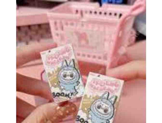 A Mini Labubu from the Monsters Exciting Macaron Vinyl Blind Box Collectible Series