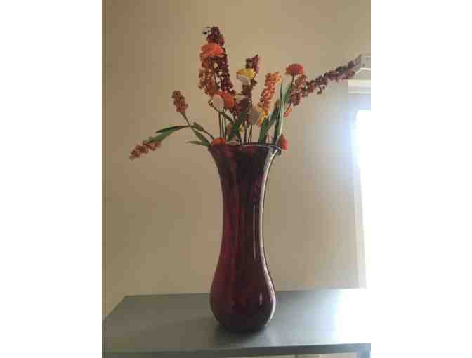 Red Glass Vase with Flower Arrangement