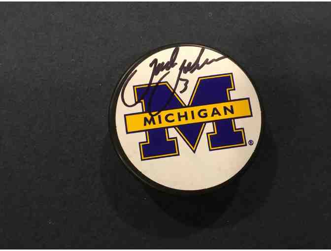 Jack Johnson autographed Michigan hockey puck