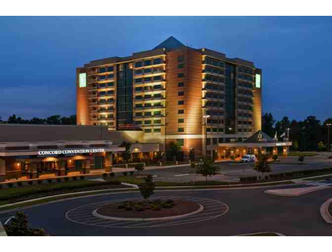 Stay at Embassy Suites by Hilton Charlotte - Concord Golf Resort & Spa and spa gift card - Photo 1