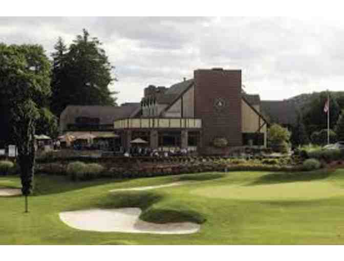 Foursome with cart at Lake Mohawk Golf Club