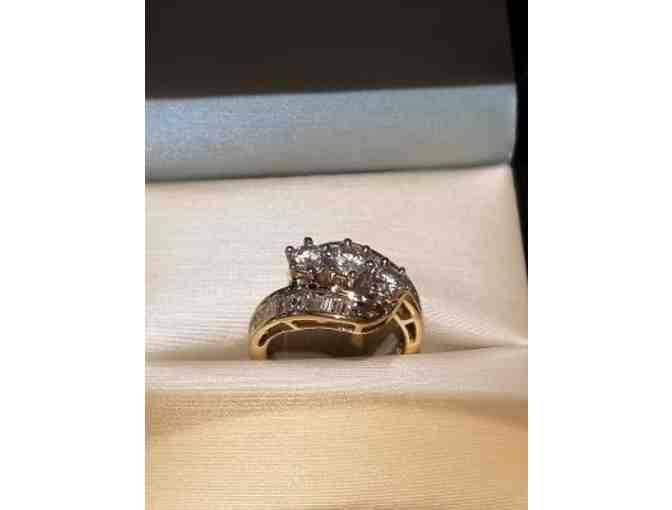 14k Yellow Gold Channel set Round Brilliant and Baguette ring.