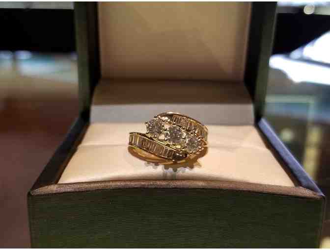 14k Yellow Gold Channel set Round Brilliant and Baguette ring.