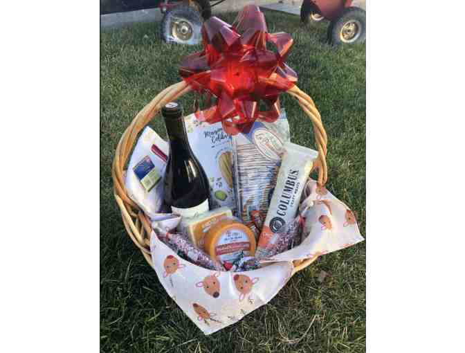 Charcuterie basket with wine